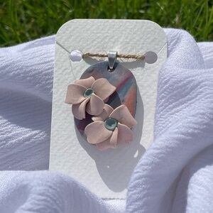 Handmade Floral Clay Pendant with Pink and Blue Accents